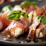Prosciutto Wrapped Mozzarella Bites with basil and balsamic glaze